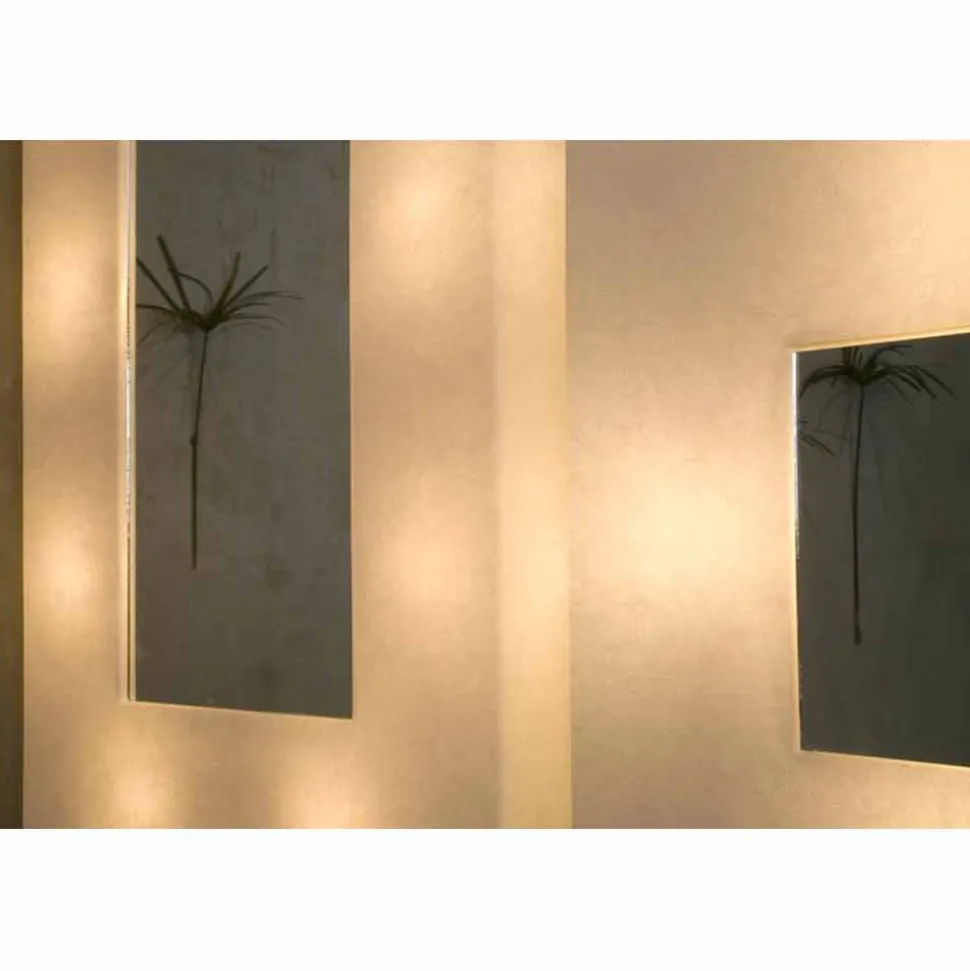 Lampada con specchio a muro di design In-es.artdesign Ego in nebulite