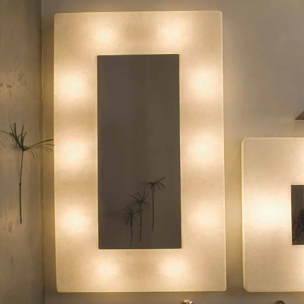 Lampada con specchio a muro di design In-es.artdesign Ego in nebulite