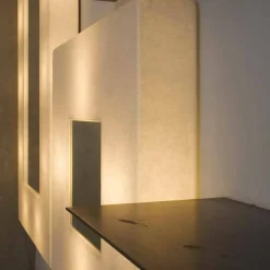 Lampada con specchio a muro di design In-es.artdesign Ego in nebulite