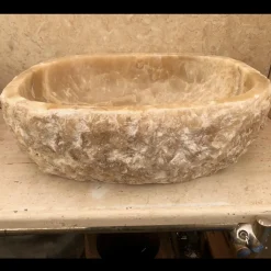 Lavabo di design da appoggio per bagno Laia in pietra naturale