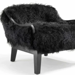 Poltrona da salotto bassa in pelle e pelo nero, made in Italy, Eli